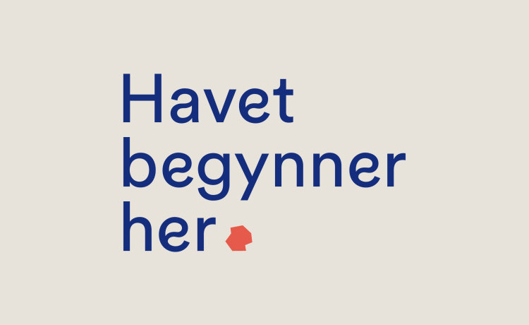 Plakat med teksten Havet begynner her